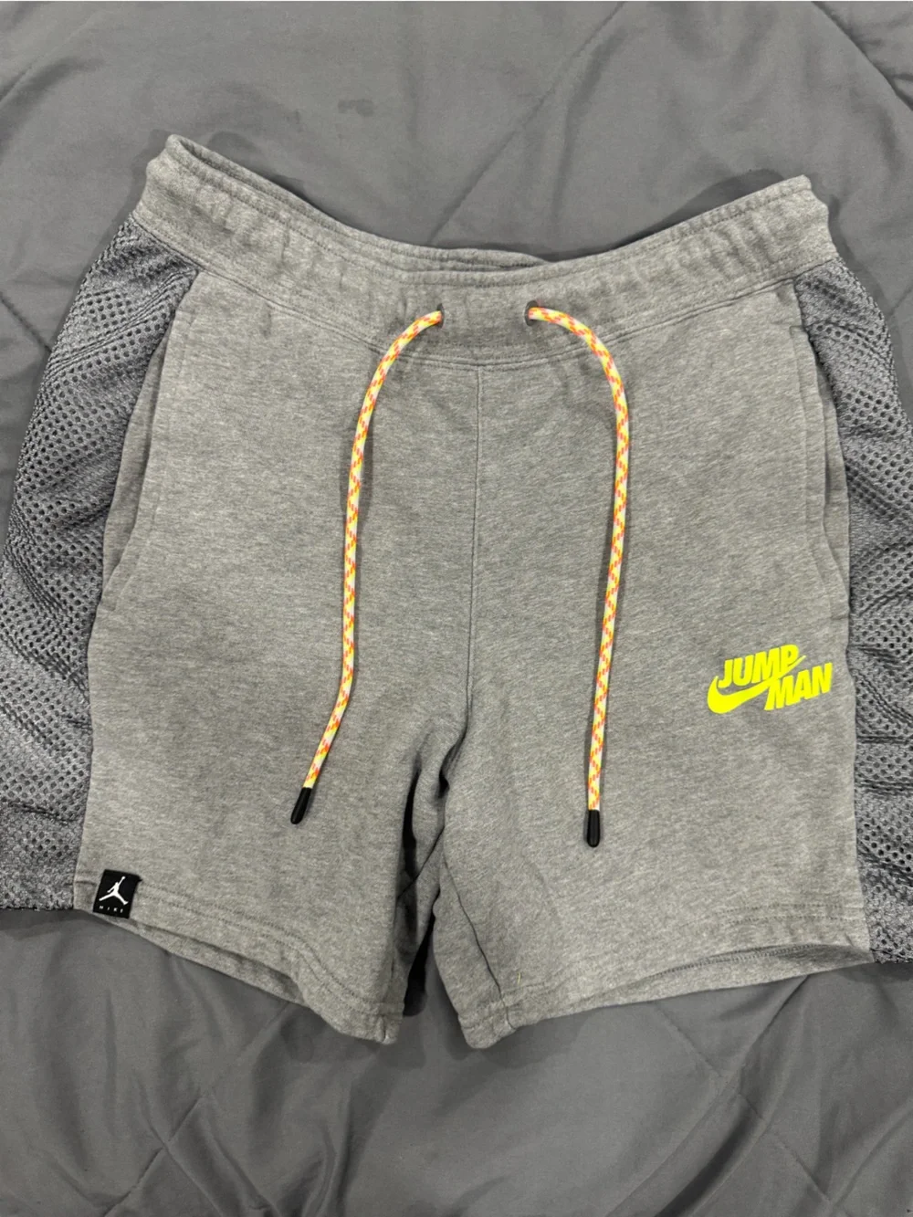 Jordan Men’s Grey Athletic Shorts with Neon Yellow Logo and Orange Drawcord